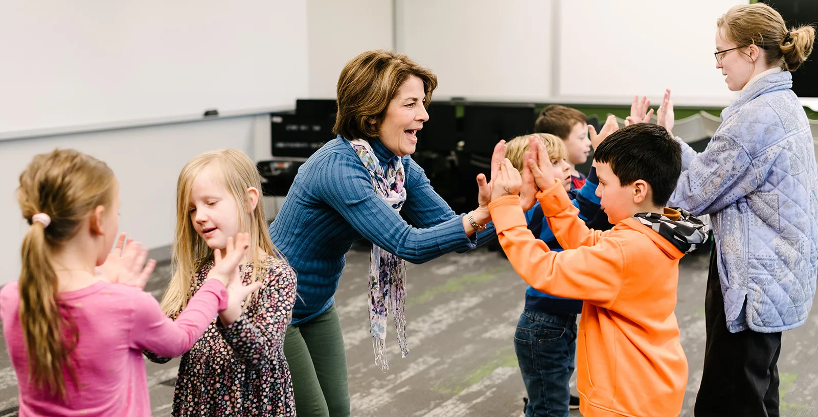 Students and teachers in a music class