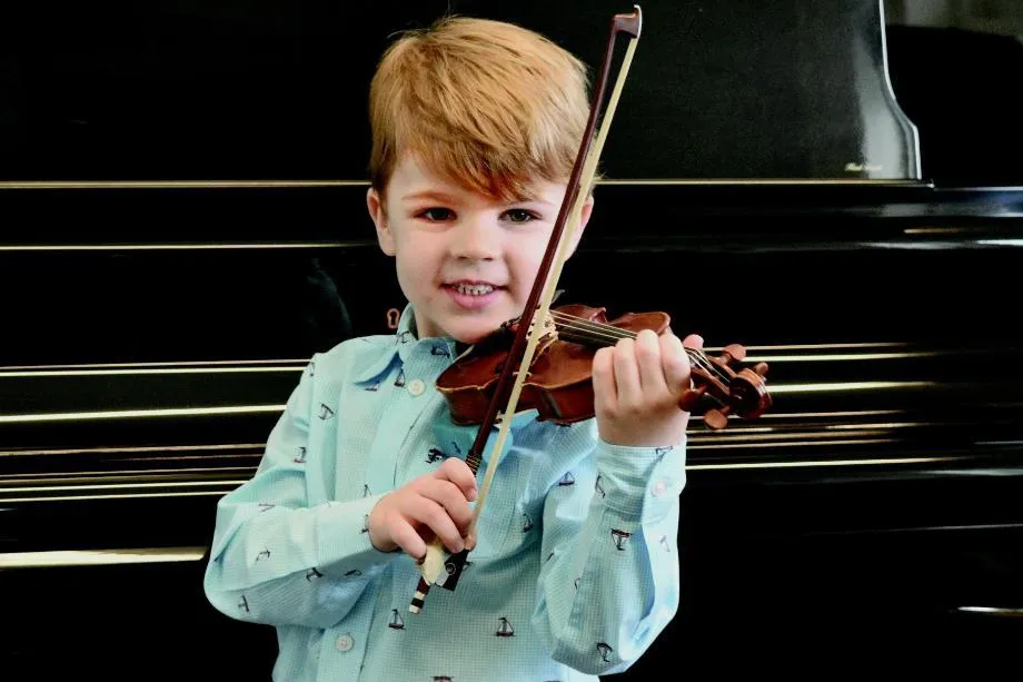 young boy with violin