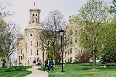 Blanchard Hall with students walking on Wheaton College Campus