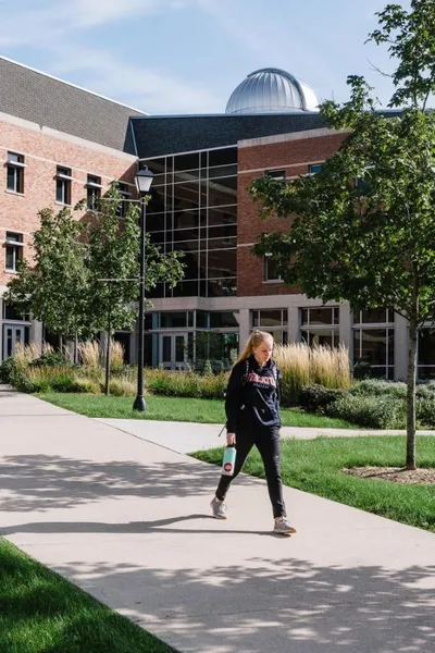 Student Walking Outside Meyer Science Center