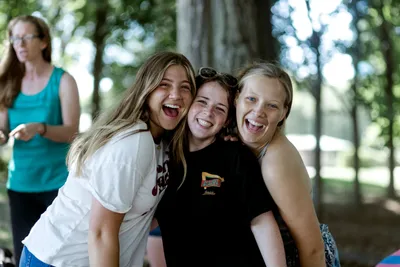 Happy female Passage students outdoor