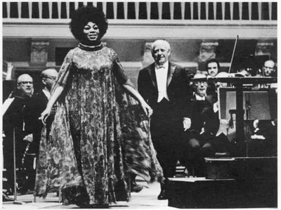 A woman singing on stage