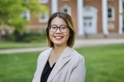 Office Coordinator Smiling Outside