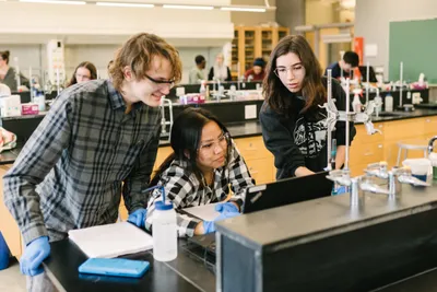 Three Wheaton College Students in Chemistry Lab