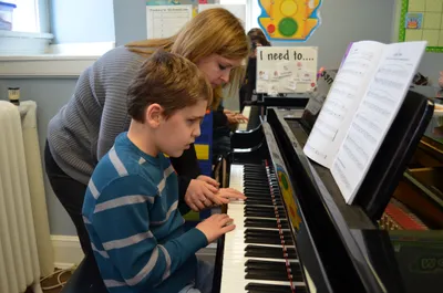 BB piano student at keyboard