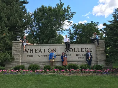 Summer Music Camp Musicians by Wheaton Sign