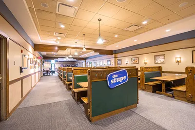 A dining place with booths and tables