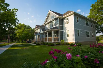 A townhouse with front lawn