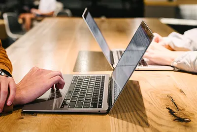 Two laptops on a desk