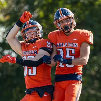 2-football-guys-jumping
