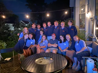 President Ryken with Dekes in his backyard.