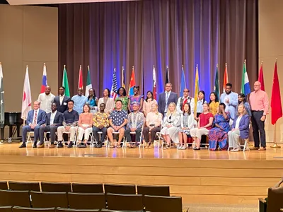President Ryken with the Billy Graham Scholars and their national flags.