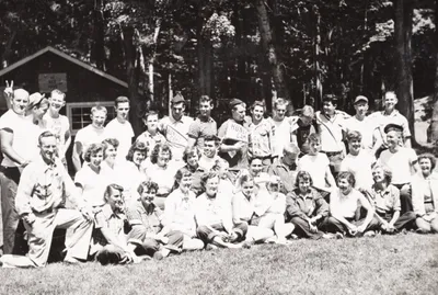 A group of college students and leaders posing after the first summer at HoneyRock
