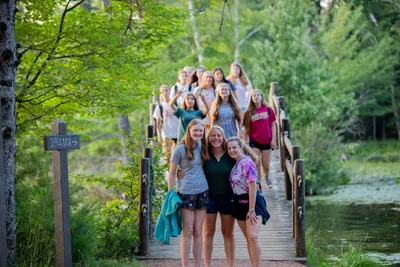 high school girls on a bridge