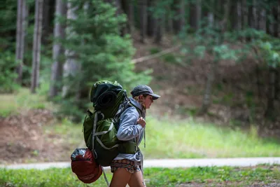 A girl hiking in woods