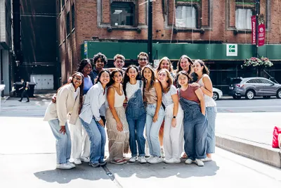 A group of students smiling.