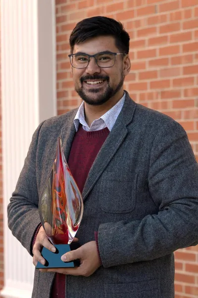 800x1200 Dr-Jordan-Ryan-with-award