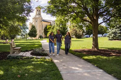 Three Dekes walking on Blanchard Lawn