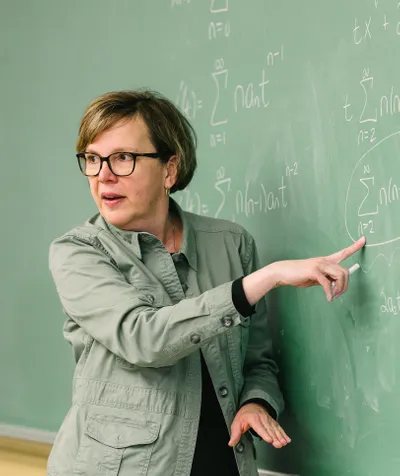 Dr Mary Vanderschoot at the Blackboard