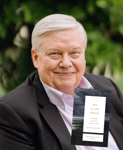 Dr. Mark Talbot with his book When the Stars Disappear