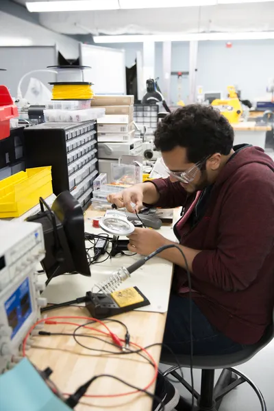 Student in Wheaton College Physics Lab