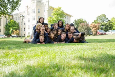 A group of students lying on lawn