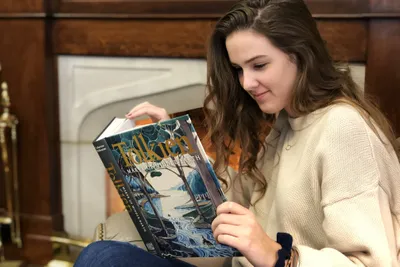A female student reading a book