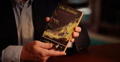 A man holding a book