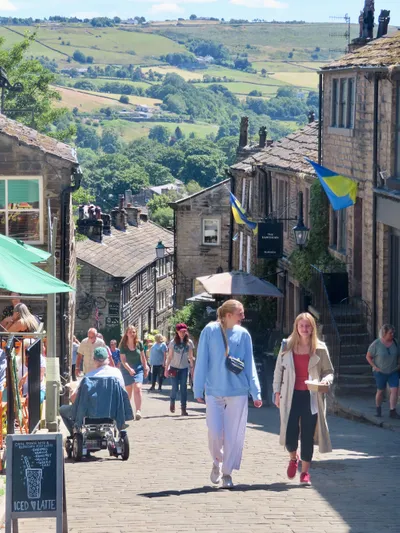 Students Walking in a Town on Wheaton in England