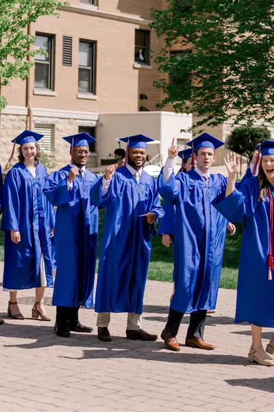 A group of undergraduate students smiling