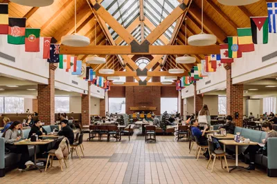 Students eating lunch in Anderson Commons or Saga.