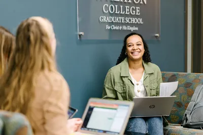 Wheaton College Graduate School Student with Laptop