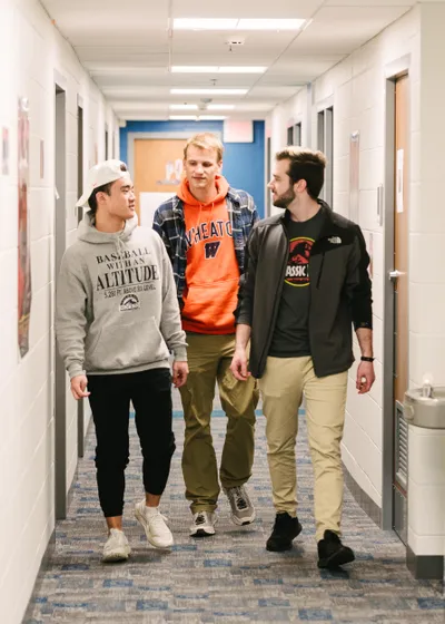 Students walking in Fischer Hall