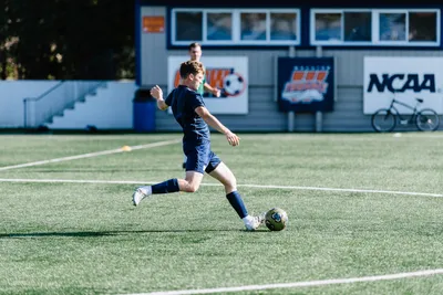 Wheaton soccer player in action