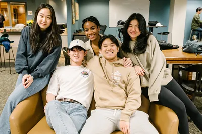 A group of students smiling.
