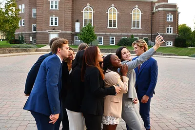 A group of students taking selfie