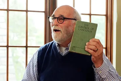 A man holding a book