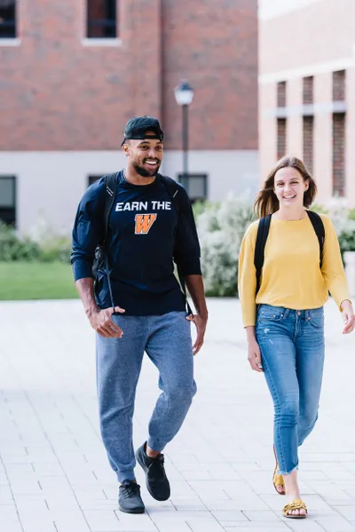 two students walking outside