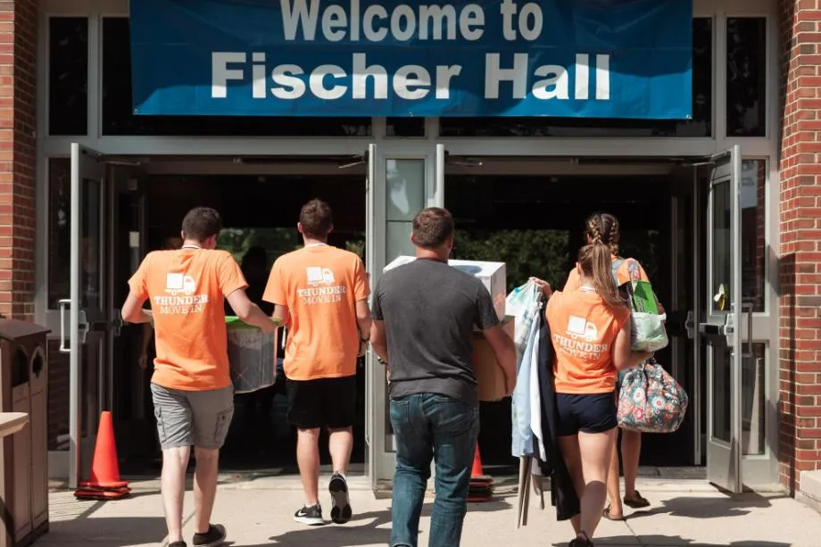 Students moving into Fischer Hall