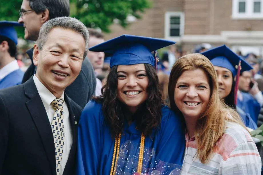 wheaton graduate with her parents