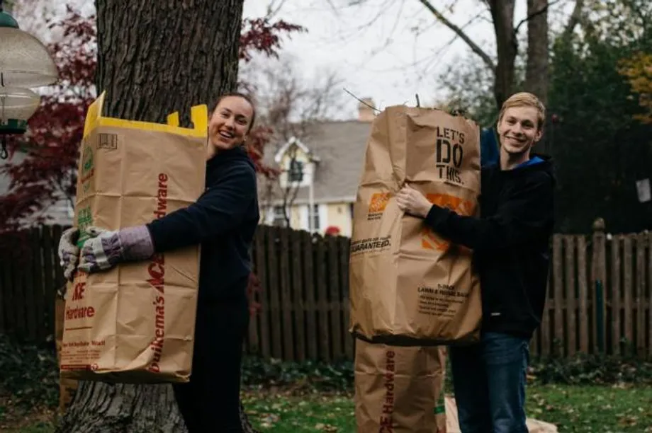 Wheaton College IL Students Carrying Bags of Leaves for Service Project