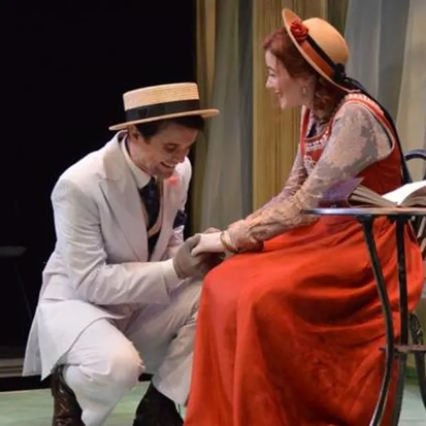Two people performing on stage