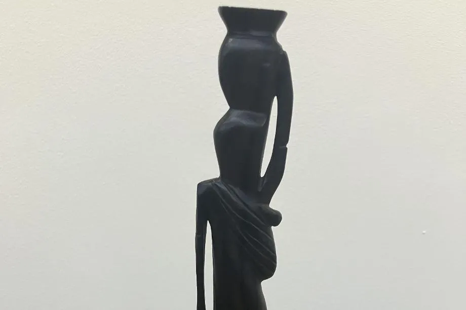 920x613 Carved figure with pot