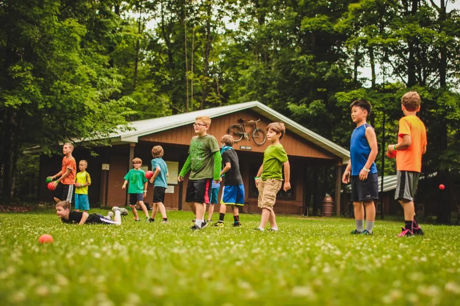 campers playing a game on the lawn