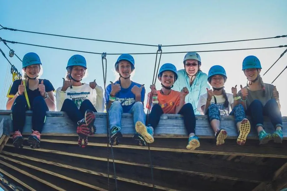 campers on challenge course