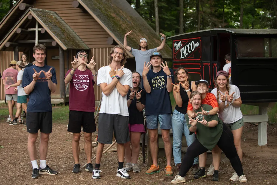 A group of summer staff being excited by Zacco