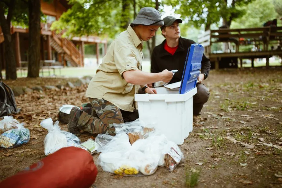 Students unpacking after a trip Our People Variant