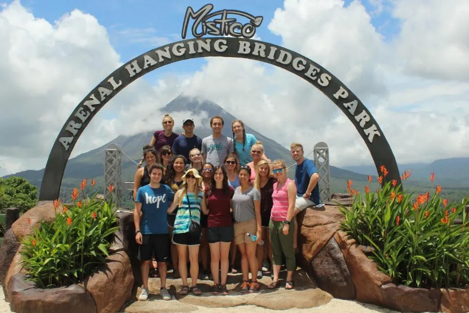Wheaton in Costa Rica Students under arch