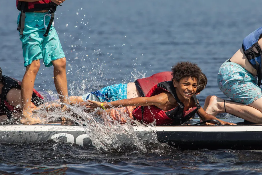 Campers on Paddle Board