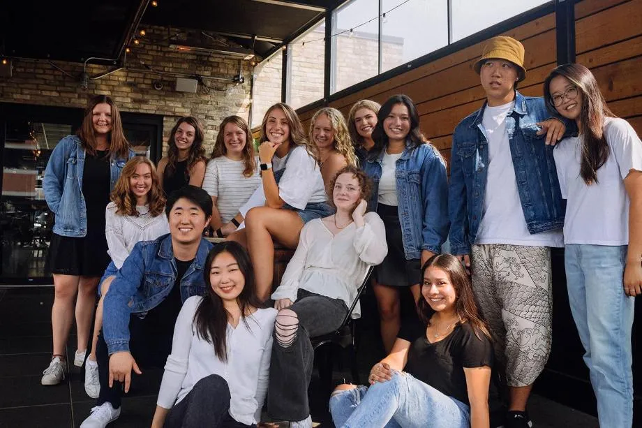 A group of students smiling.
